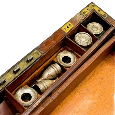 Lot 67 - A Georgian mahogany and brass bound campaign writing slope by Gaimes.