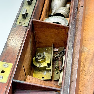 Lot 67 - A Georgian mahogany and brass bound campaign writing slope by Gaimes.
