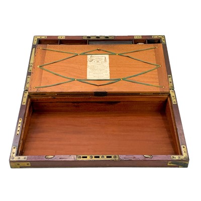 Lot 67 - A Georgian mahogany and brass bound campaign writing slope by Gaimes.