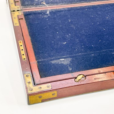 Lot 67 - A Georgian mahogany and brass bound campaign writing slope by Gaimes.