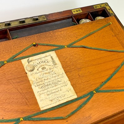 Lot 67 - A Georgian mahogany and brass bound campaign writing slope by Gaimes.