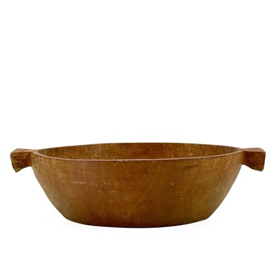 Lot 261 - An African carved wood deep bowl.