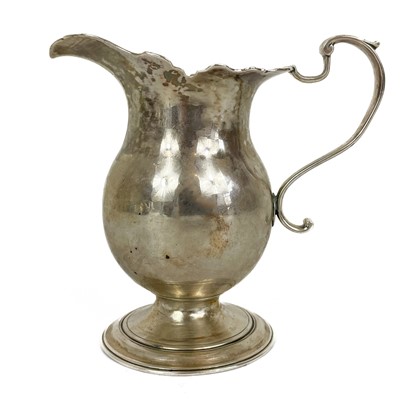 Lot 55 - A Georgian silver provincial pedestal cream jug.