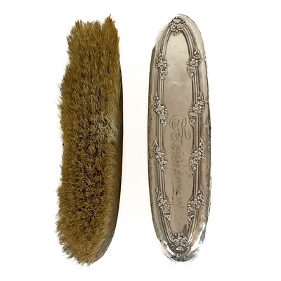 Lot 295 - Six silver backed brushes and a silver backed hand mirror.