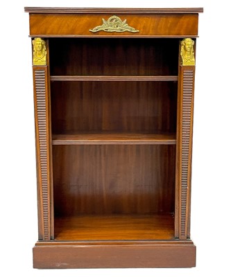 Lot 1820 - An Empire style low mahogany bookcase.