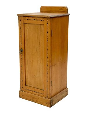 Lot 1851 - A late Victorian ash pot cupboard with unusual crossband decoration.