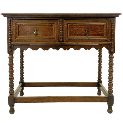 Lot 1854 - An early 20th century oak side table .