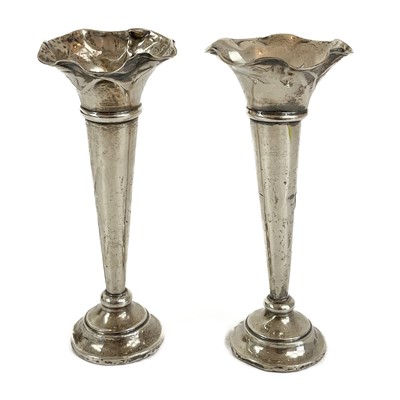 Lot 228 - A pair of George V silver pedestal  bud vases.