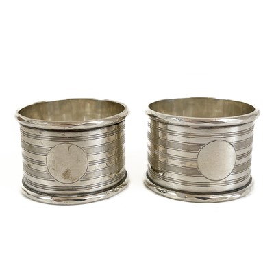 Lot 119 - A pair of George V silver napkin rings by Bravingtons Ltd