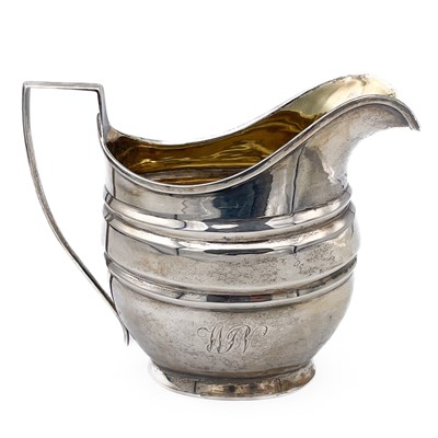 Lot 357 - A George III silver milk jug