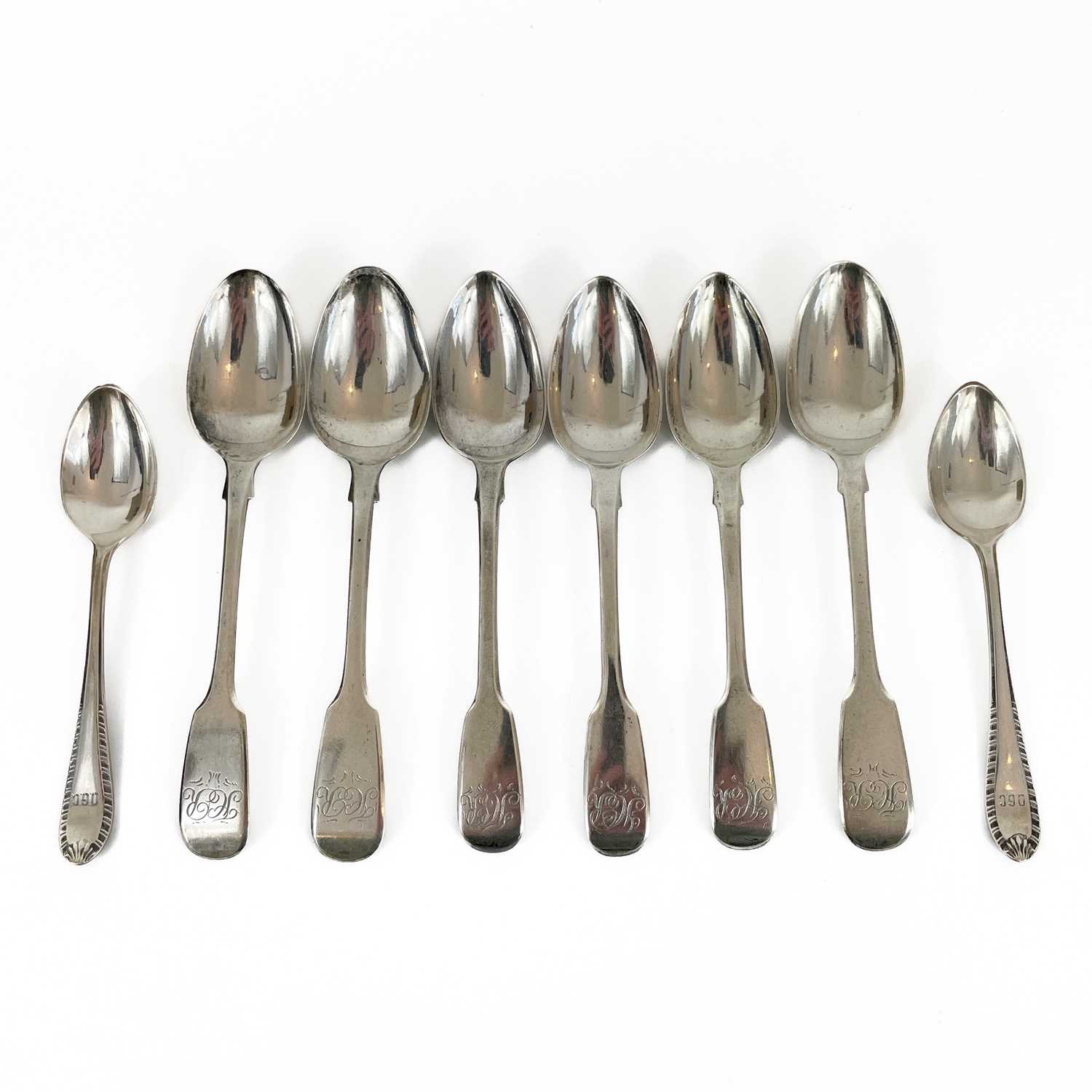 Lot 202 - Six silver tea spoons and two silver coffee spoons.