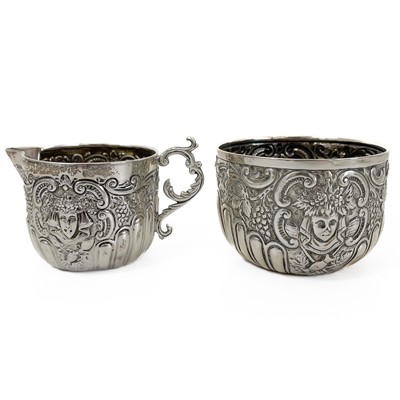 Lot 338 - An Edwardian silver cream jug and sugar bowl by Goldsmiths & Silversmiths Co Ltd.