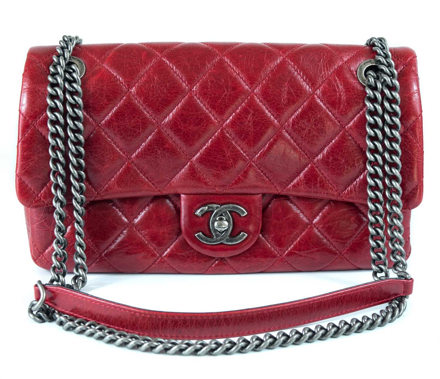 Lot 379 - A Chanel ox blood quilted lambskin leather single flap bag with turn-lock.