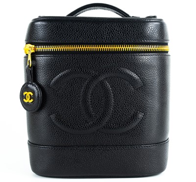 Lot 143 - A Chanel black cavier leather vanity case.