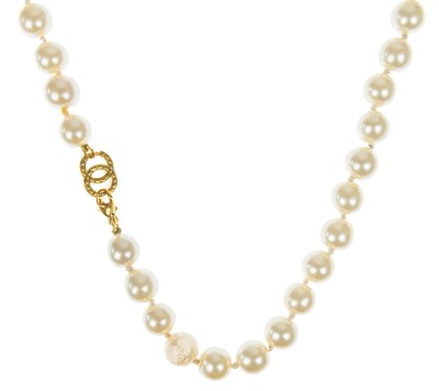 Lot 604 - A Chanel faux pearl necklace.