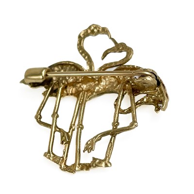 Lot 261 - A modern 9ct gold flamingo brooch.