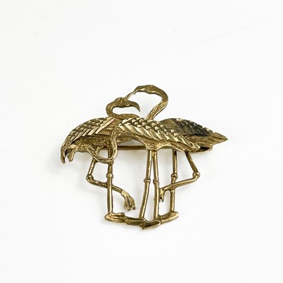 Lot 261 - A modern 9ct gold flamingo brooch.