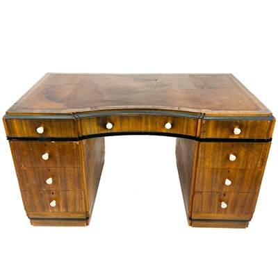 Lot 1801 - A Liberty & Co Art Deco ebonised and walnut pedestal desk.