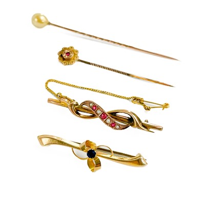 Lot 67 - Two 9ct gem set bar brooches and two 9ct stick pins.