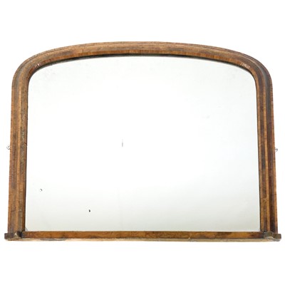 Lot 1821 - A Victorian walnut over mantle mirror.