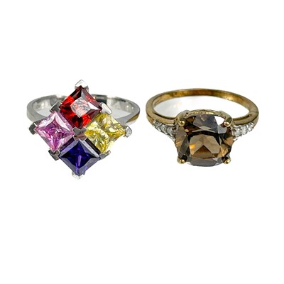 Lot 218 - Two modern gem set cocktail rings.