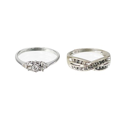 Lot 20 - Two modern 9ct white gold diamond set rings.