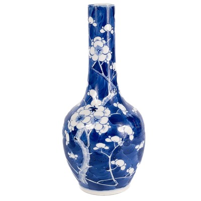 Lot 570 - A Chinese blue and white porcelain prunus pattern bottle vase, circa 1900.