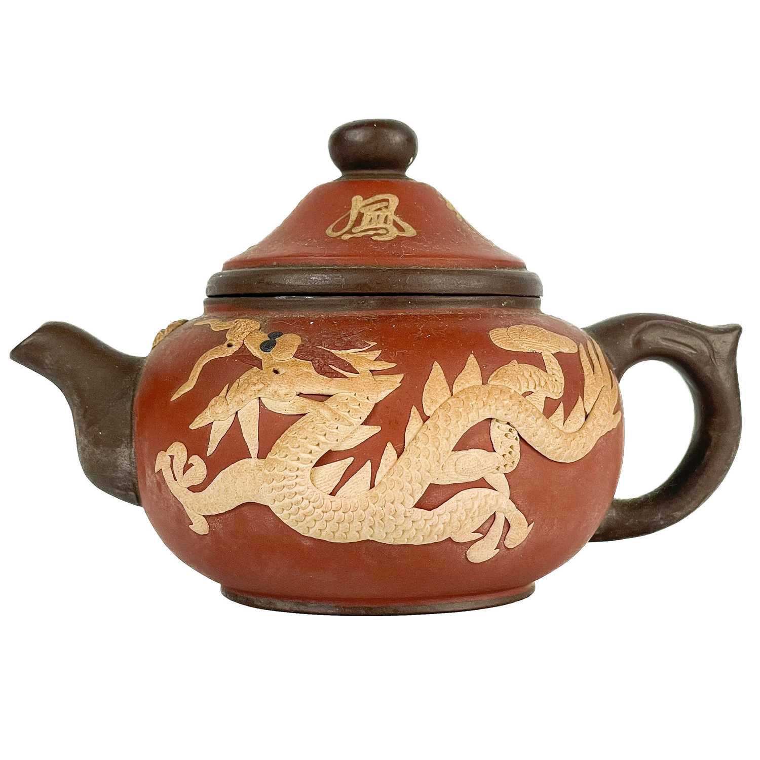 Lot 575 A Chinese Yixing pottery teapot, 19th