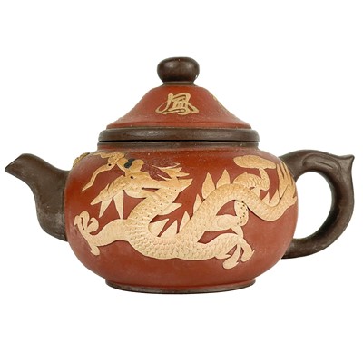 Lot 575 - A Chinese Yixing pottery teapot, 19th century.