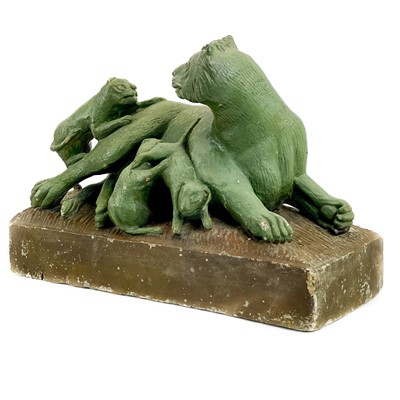 Lot 71 - A carved stone group of a lioness and three cubs.