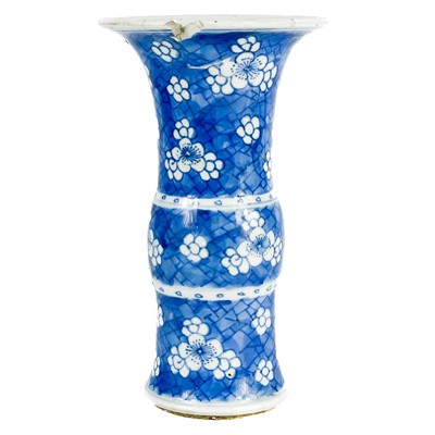 Lot 583 - A Chinese prunus pattern blue and white porcelain Gu vase, late Kangxi.