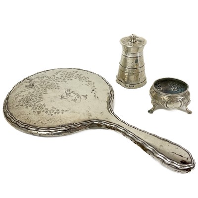 Lot 148 - A Georgian silver handled mirror, a pepperette and a salt bowl.