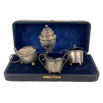 Lot 347 - A silver pepperette by Samuel Walton Smith together with three mustard pots.