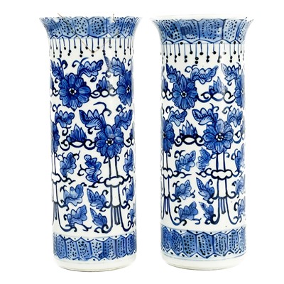 Lot 573 - A pair of Chinese blue and white porcelain sleeve vases, late 19th century.