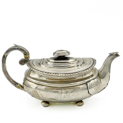 Lot 372 - A George III Scottish silver teapot by George McHattie .