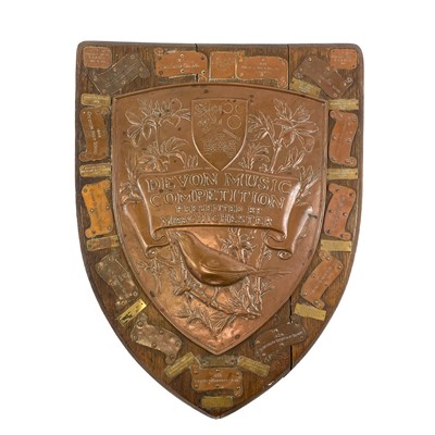 Lot 111 - A Newlyn copper shield shape Devon Music Competition trophy.