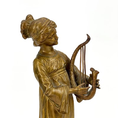 Lot 31 - A bronze figure of a female musician by Affortunato Gori.