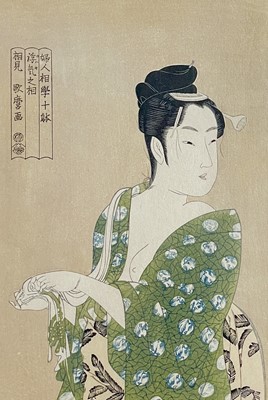 Lot 239 - A Japanese woodblock print of a semi nude lady.