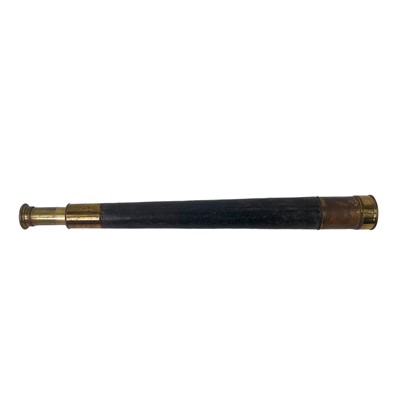 Lot 112 - A brass and leather bound telescope.