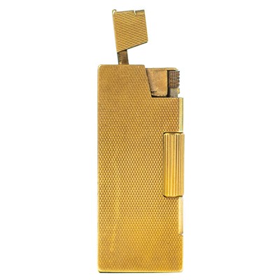 Lot 328 - A 9ct gold Rollboy lighter by A D Bach.