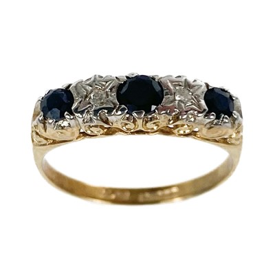 Lot 55 - Two 9ct gold diamond and sapphire set rings.