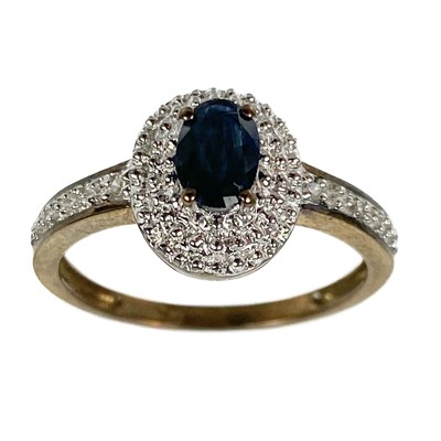 Lot 55 - Two 9ct gold diamond and sapphire set rings.
