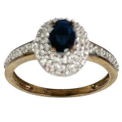 Lot 55 - Two 9ct gold diamond and sapphire set rings.