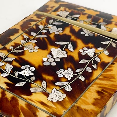 Lot 62 - A Victorian tortoiseshell card case.