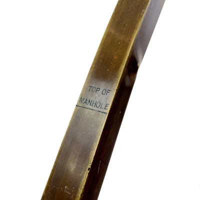 Lot 263 - An early 20th century square brass oil dipstick.