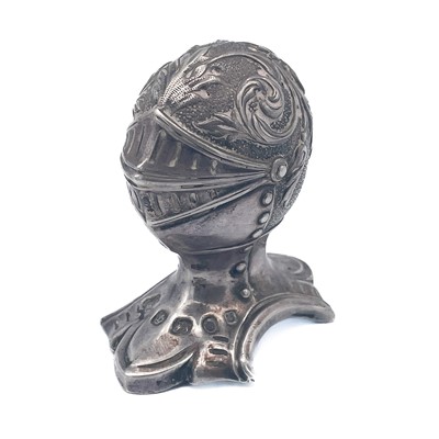 Lot 26 - A Victorian silver novelty pepperette in the form of a knight's helmet.