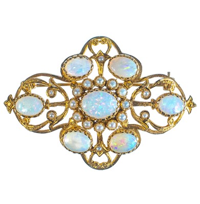 Lot 40 - A 9ct Edwardian style white opal and pearl set openwork brooch.