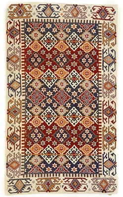 Lot 195 - A chainstitch rug.