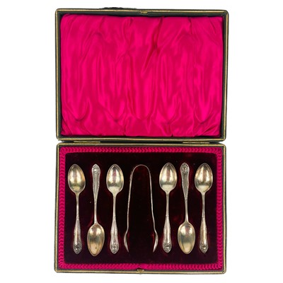 Lot 167 - An Edwardian silver set of six cased teaspoons and sugar tongs.