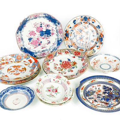 Lot 128 - Twelve Chinese porcelain plates and shallow bowls, 18th century.